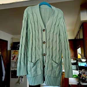 XL women’s knit cardigan blue/mint color. Nice and thick for fall/winter